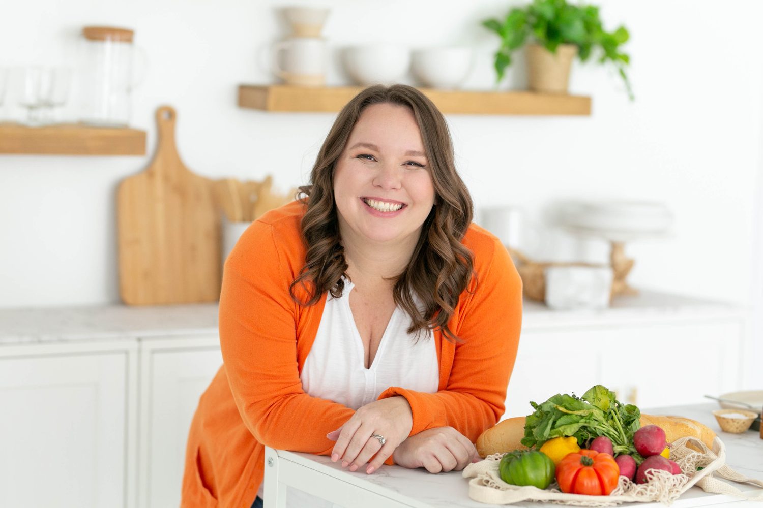 Rosie Gizelt, founder of Click to Table, in a bright kitchen